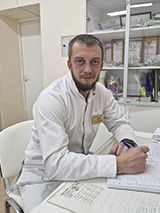 Заведующий стоматологической поликлиникой, врач-стоматолог Петренко Никита Викторович